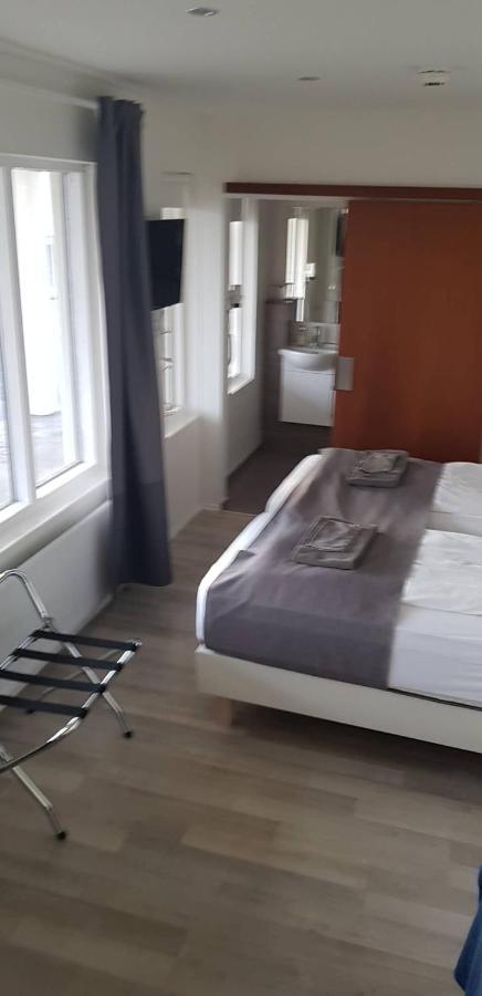 Apotek Guesthouse Хофн Экстерьер фото